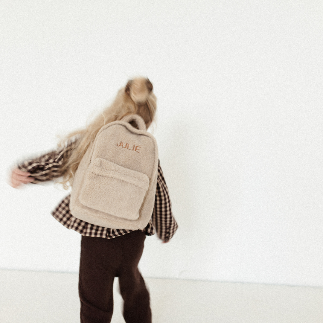 Een gepersonaliseerde rugzak van teddy