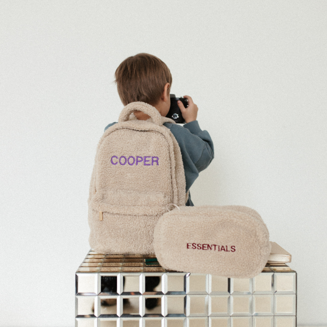 Een gepersonaliseerde rugzak van teddy