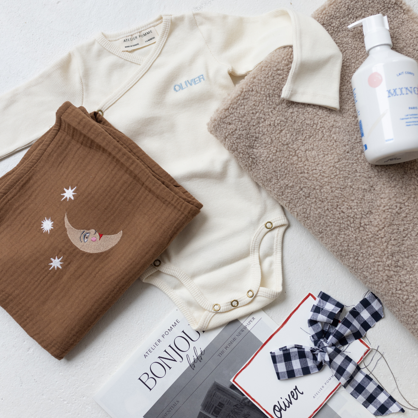 Giftbox met gepersonaliseerde romper, laken, handdoek