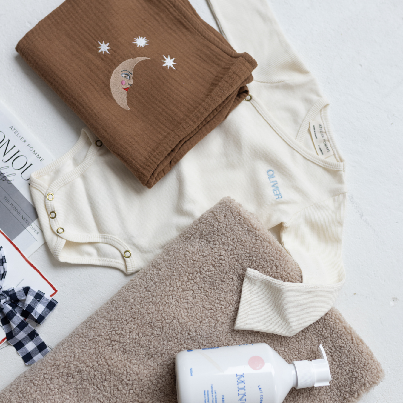 gepersonaliseerde romper, laken en handdoek