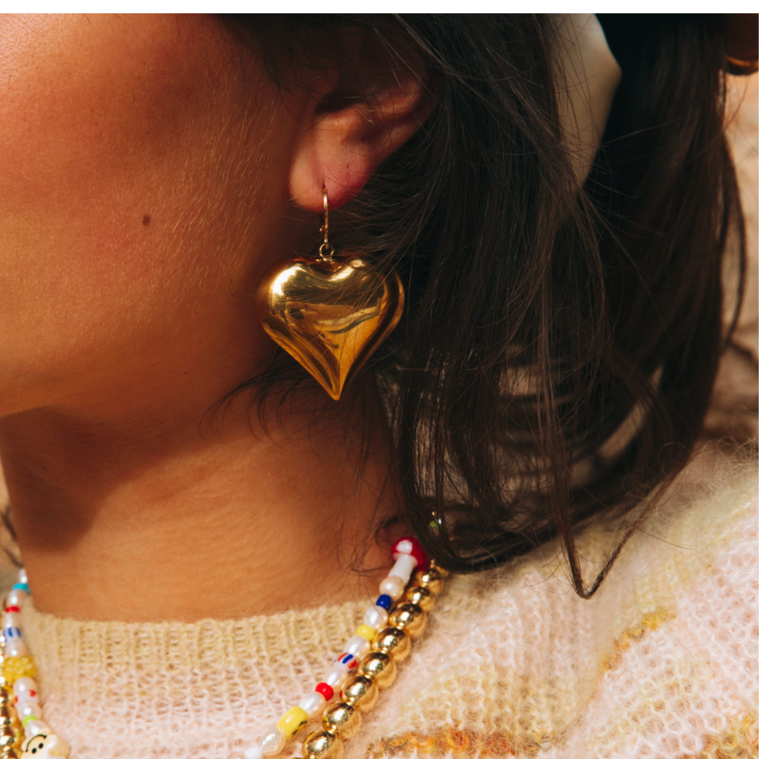 Een gouden hartjes bedel