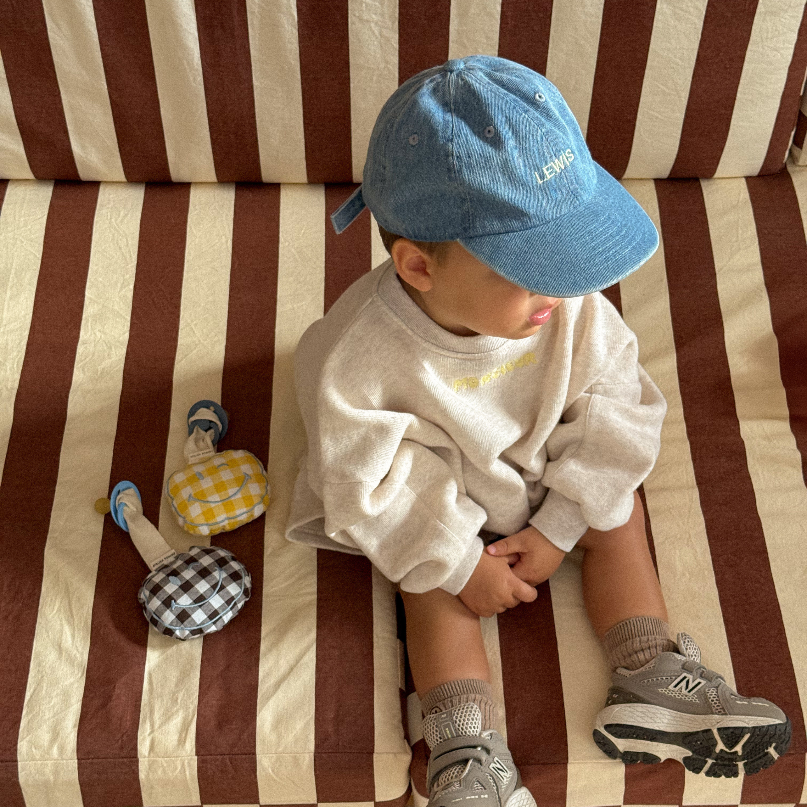 Een geruit speendoekje met personalisatie