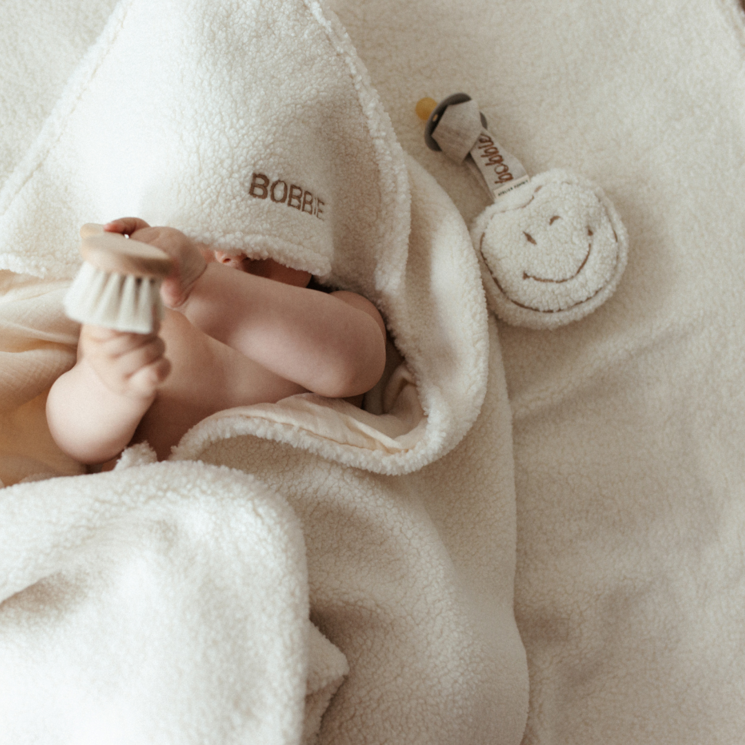 Een gepersonaliseerd speendoekje van teddy