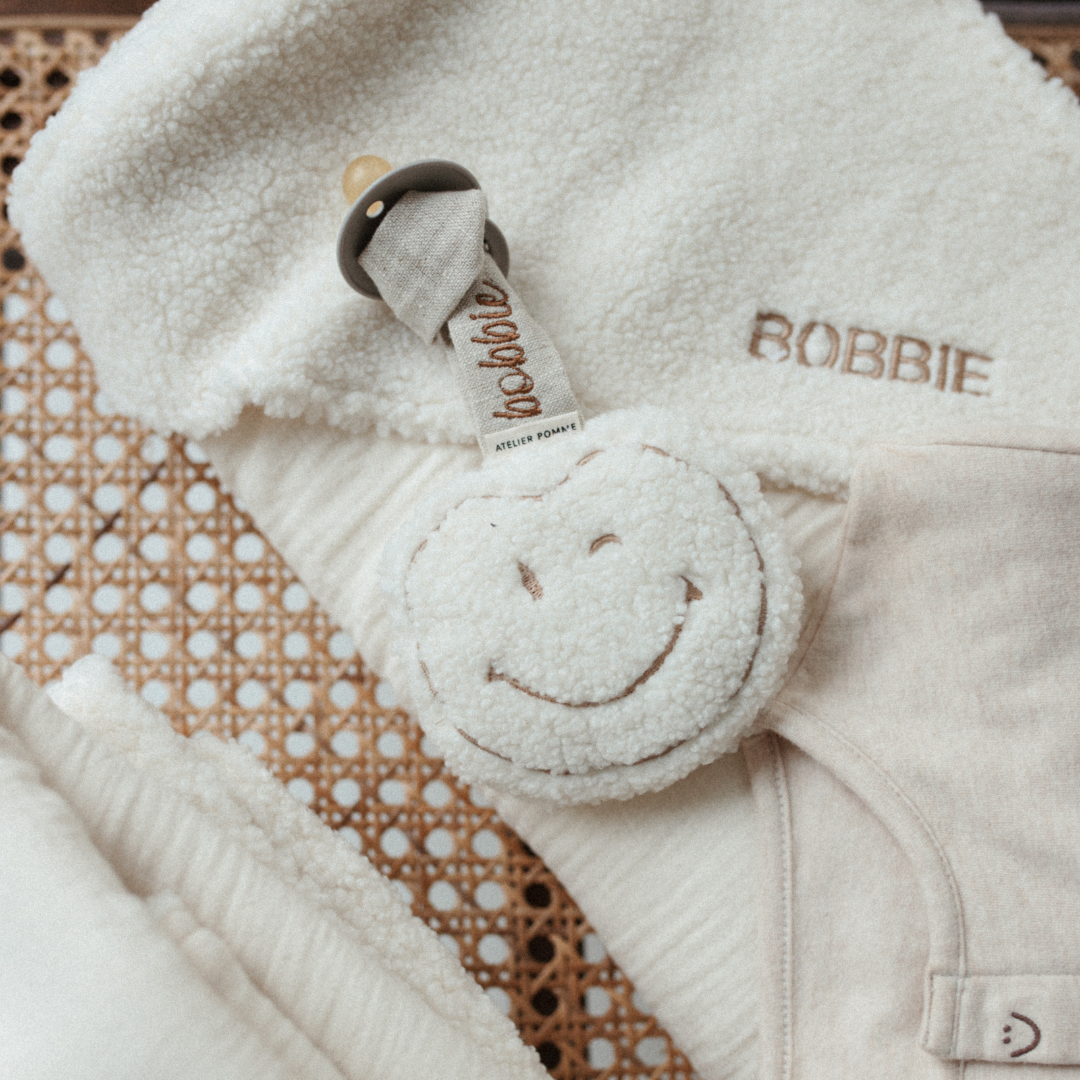 Een speendoekje van teddy met een gepersonaliseerde naam erop