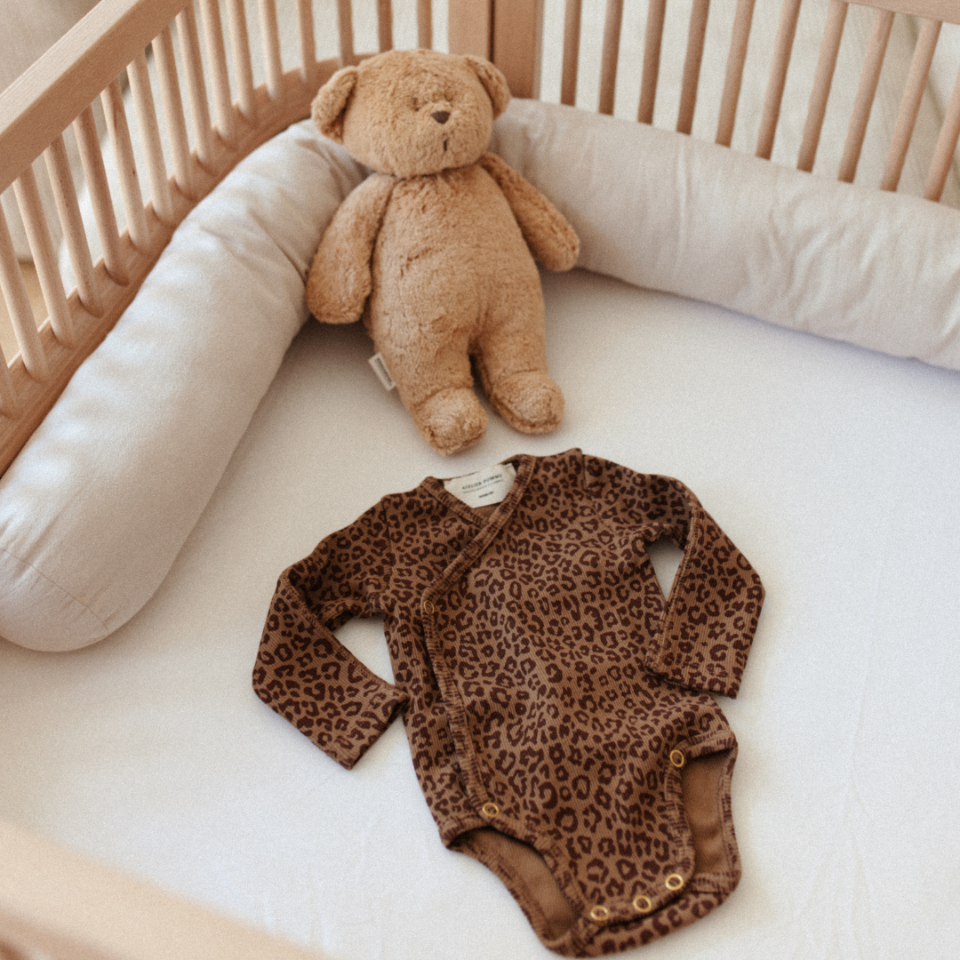 Romper wrap the baby leopard