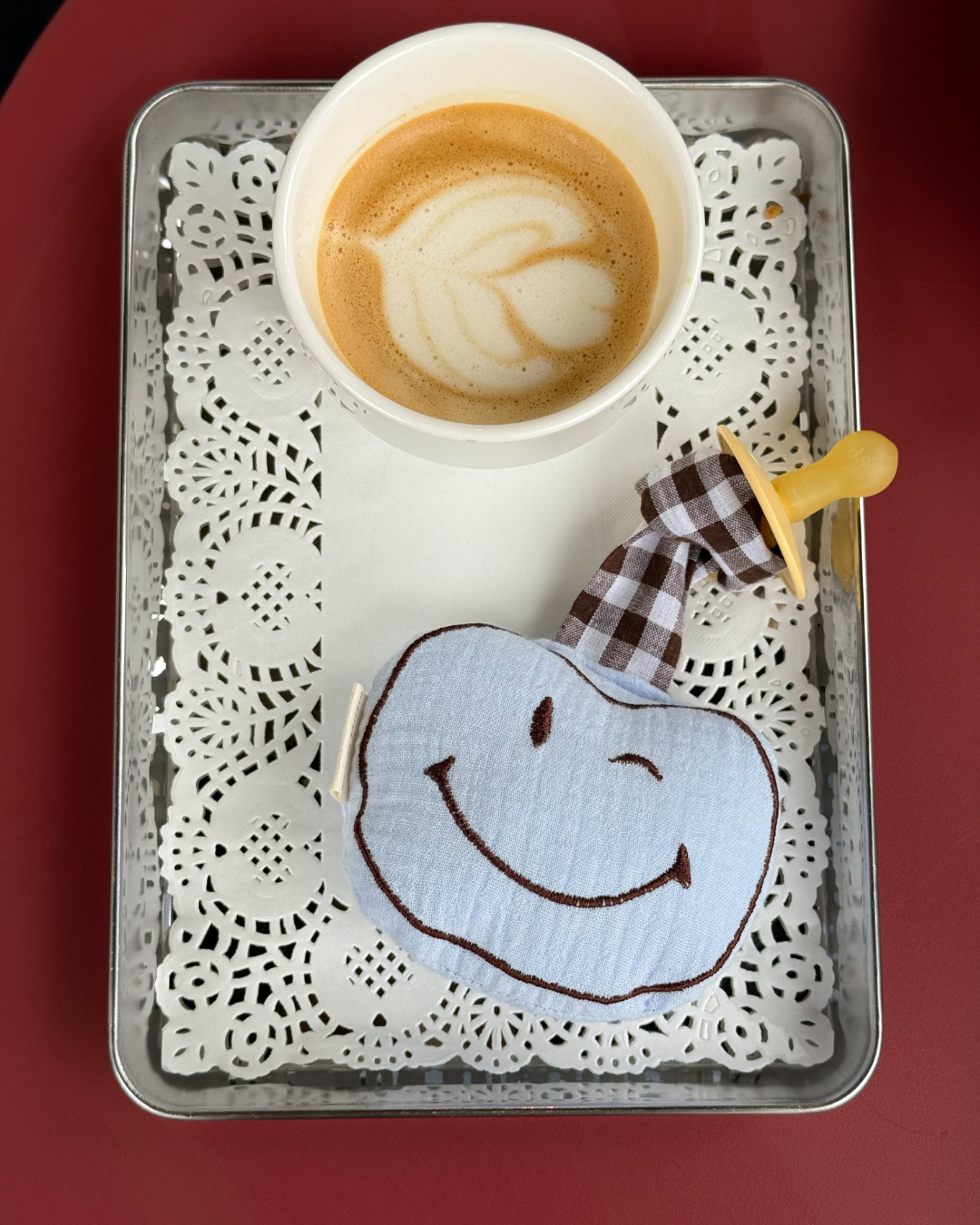 speendoekje smiley blauw bruin ruitjes